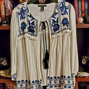 Cute light weight white with blue embroidery floral accents cover up.